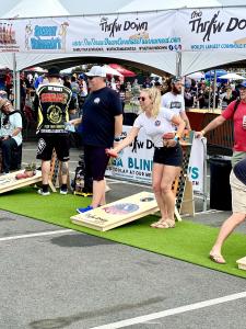 Female competitor at the The Throw Dwn Cornhole Festival