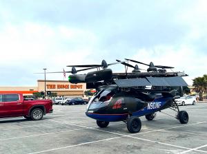 ASKA A5 flying car in a parking lot